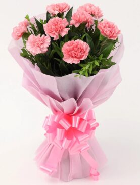 Pink Carnations in Paper Packing